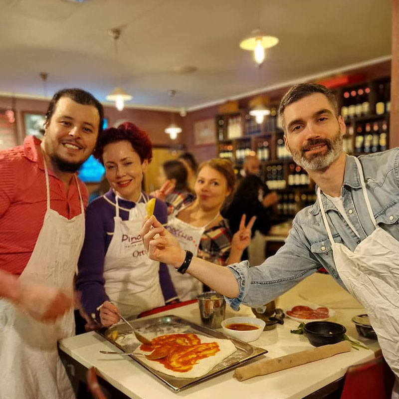 pizza team cooking at Pinocchio cookery school